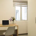 J Apartments