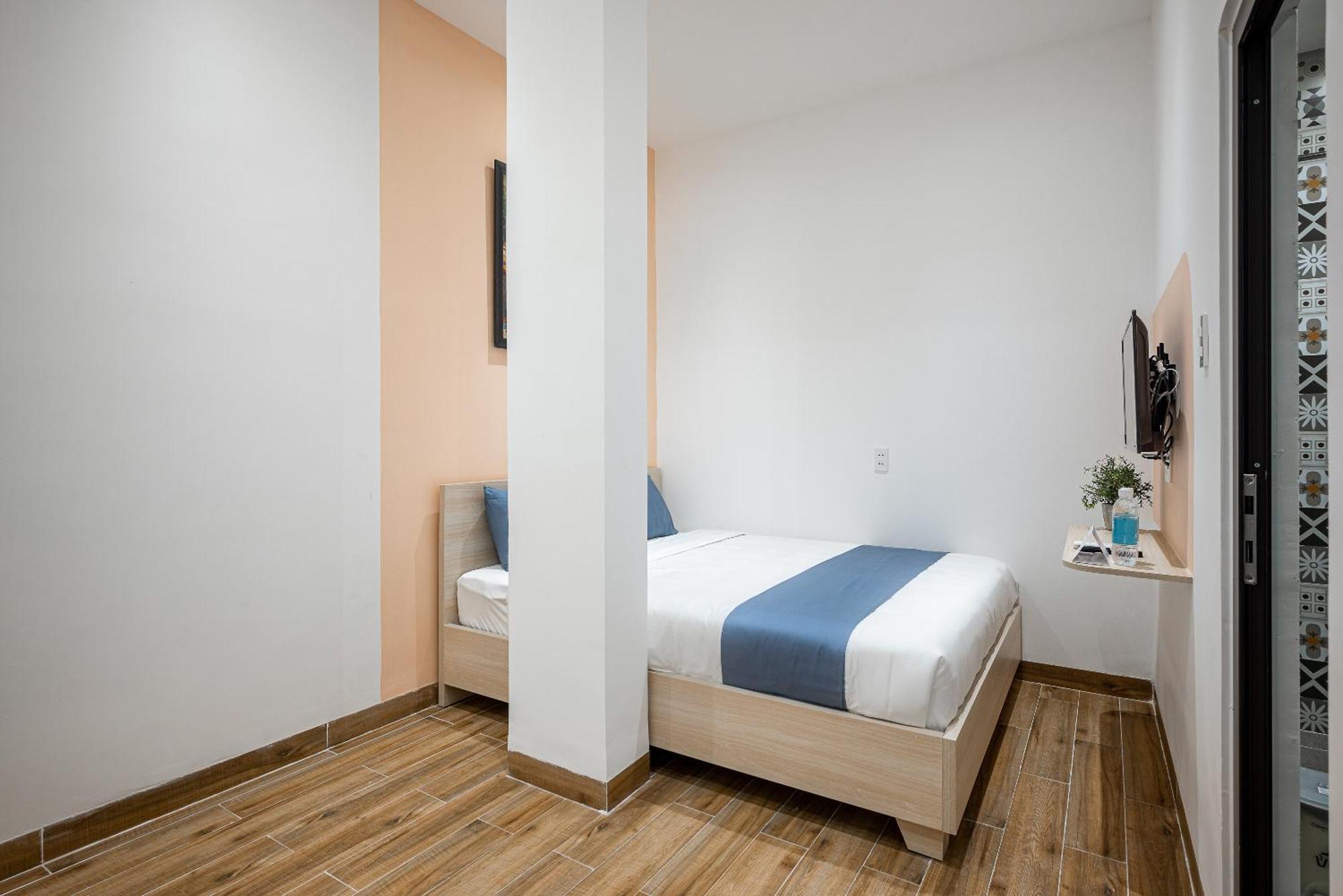 Cozrum Homes - Cozytel Apartment