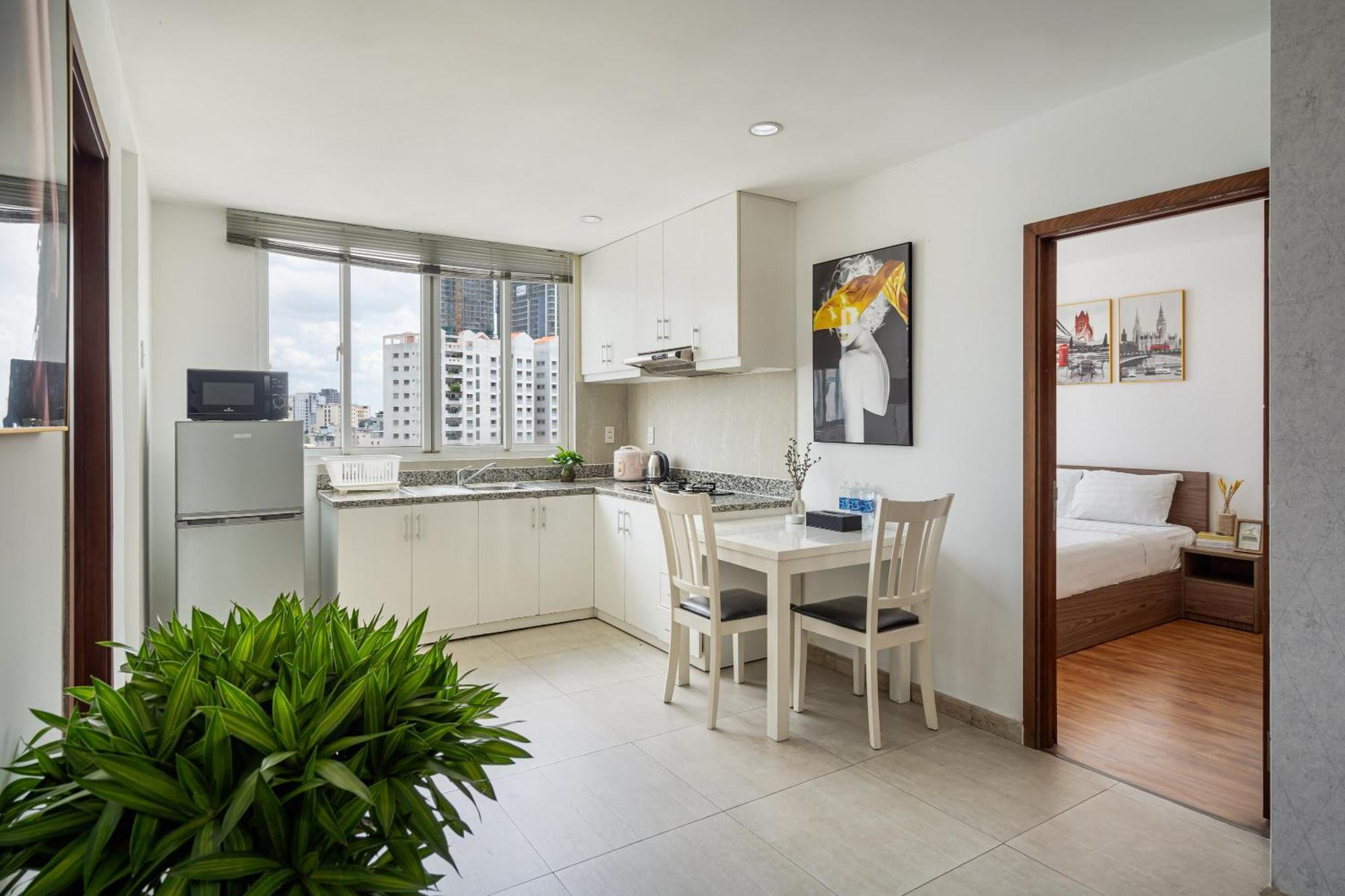 Otis - Balcony View - Steps From Bui Vien - International Plaza Building - District 1 Apartment *