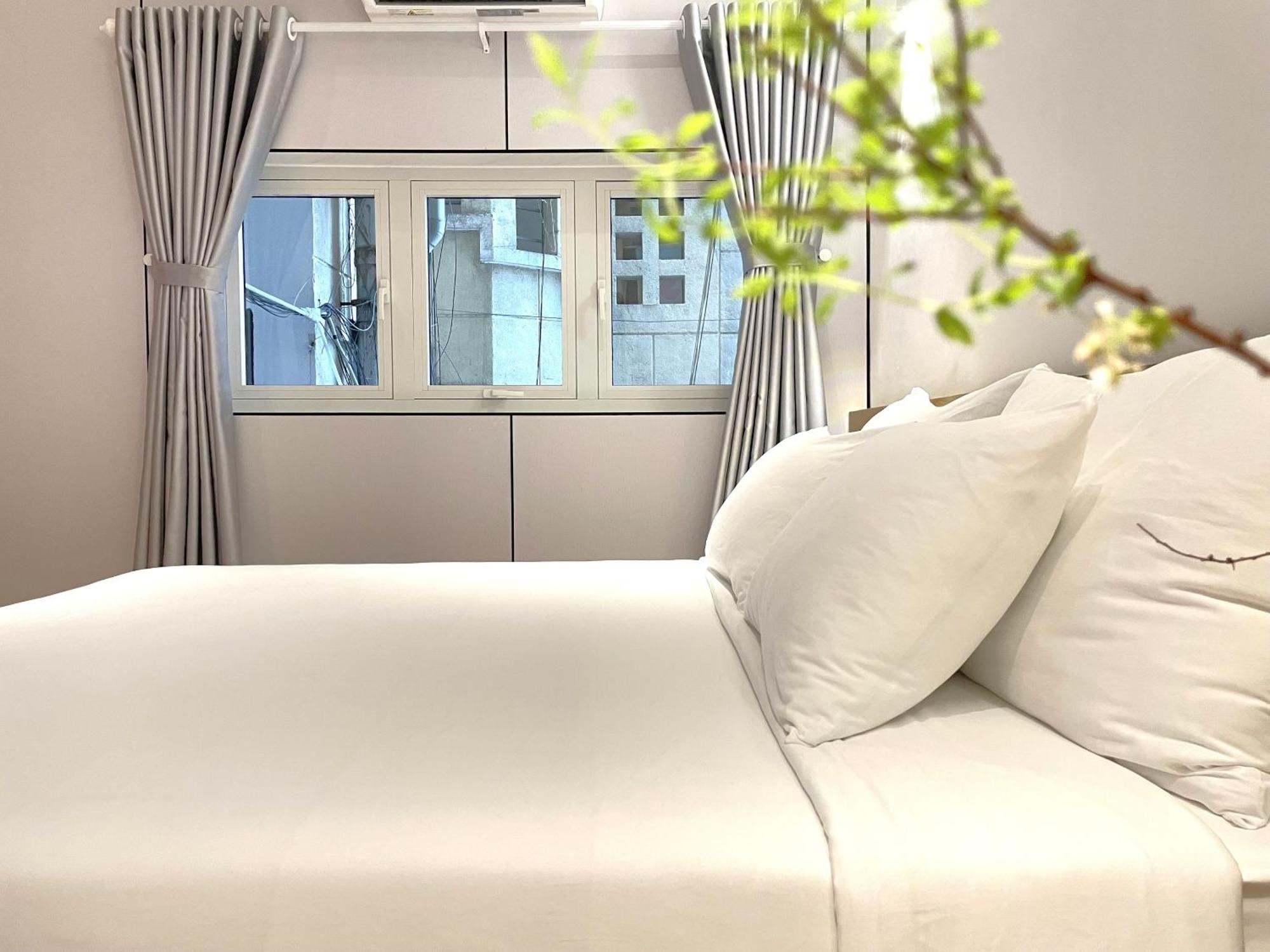 6even - Have A Staycation In The Cafe Building Khách sạn hẻo lánh TP. Hồ Chí Minh