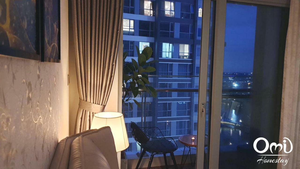 Omi Homestay - Vinhomes Central Park Apartment