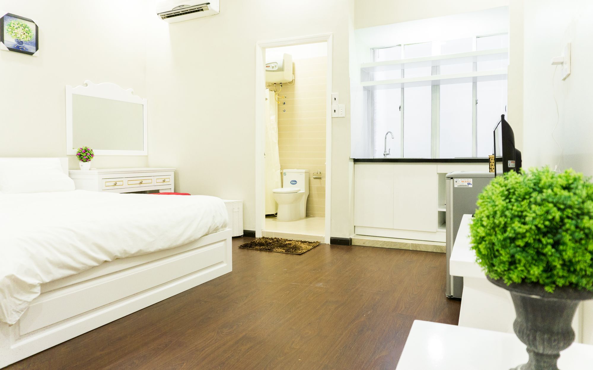 Qhome Saigon Nguyen Huu Canh *