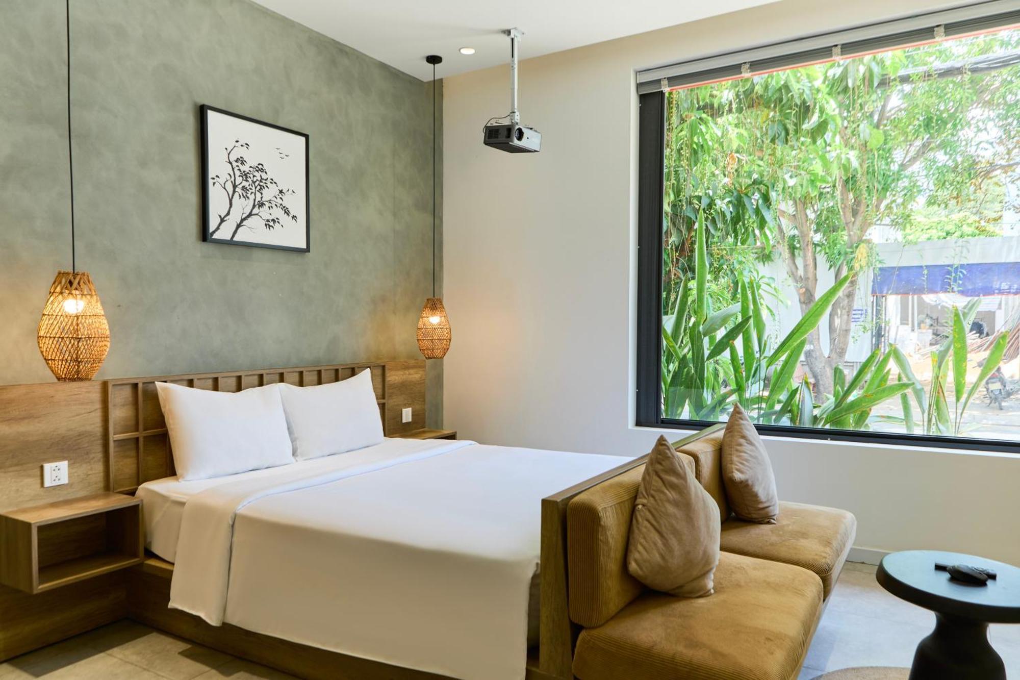 Kin Wander Tan Phong, The Moonage Aparthotel *