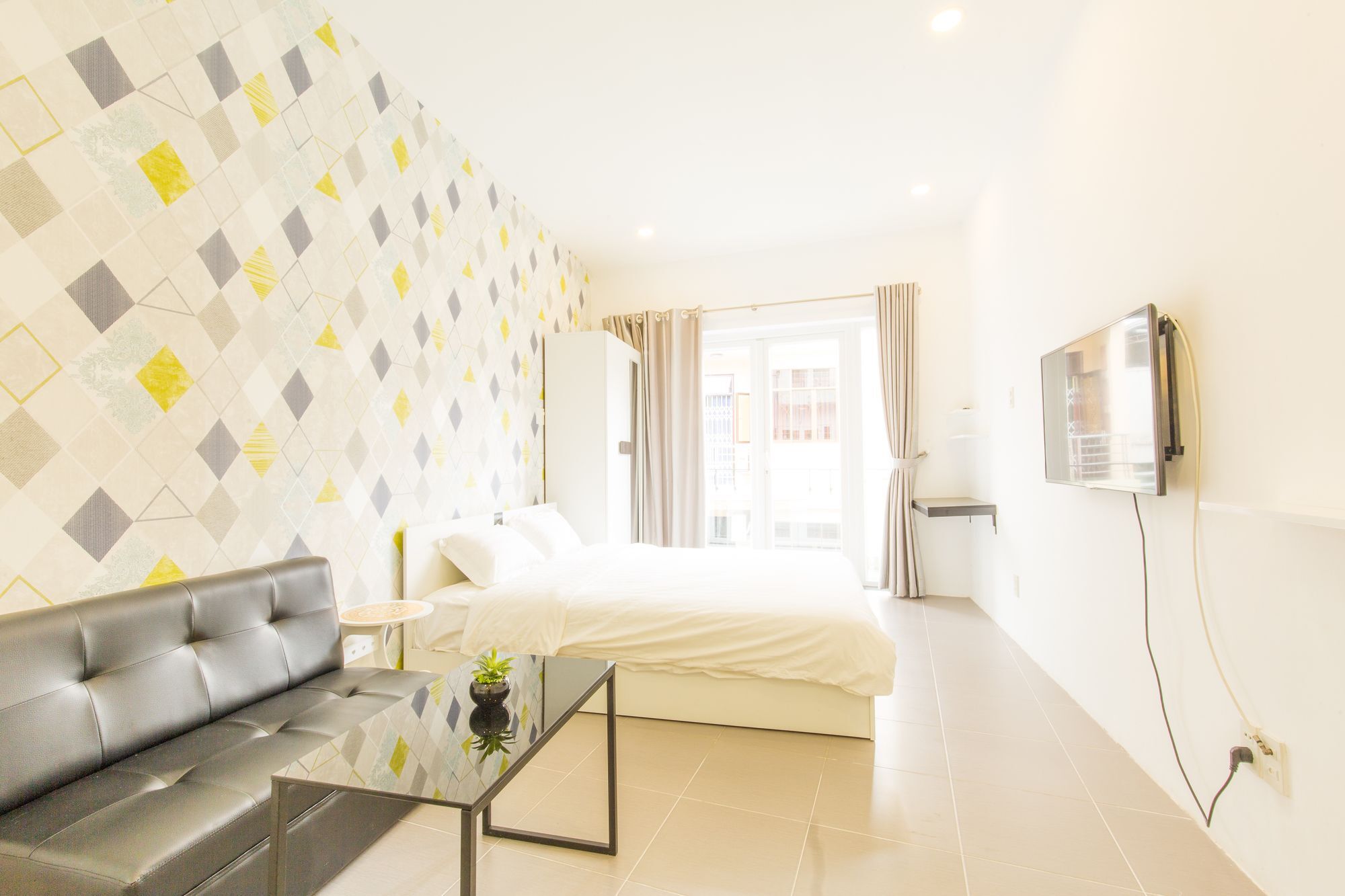 Qhome Saigon - Vo Tan Apartment